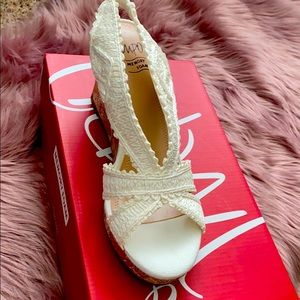 White sandal like wedge heels. Not worn Size 8 1/2